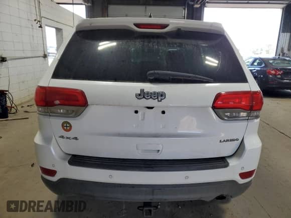 2019 Jeep Grand Cherokee Laredo E z VIN 1C4RJFAG9KC726931, wystawiony jako Copart lot #70262375 z przebiegiem 184 999 mil mil oraz Szkoda całkowita • Salvage title. Historia ofert i sprzedaży dostępna na DreamBid. Obrazek 6.
