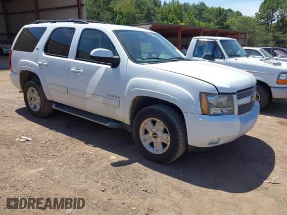 2011 Chevrolet Tahoe LT z VIN 1GNSCBE01BR377494, wystawiony jako IAAI lot #43048354 z przebiegiem 212 474 mil mil oraz . Historia ofert i sprzedaży dostępna na DreamBid. Obrazek 1.