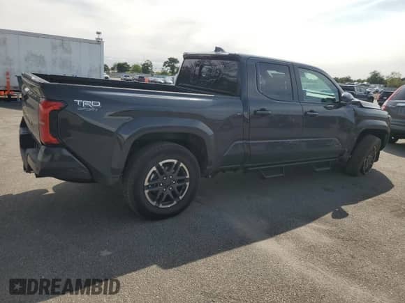 2025 Toyota Tacoma SR with VIN 3TMLB5JN9SM137792, listed as a Copart auction lot 80064475 with 6,038 mi miles and Salvage title. Bid and sale history available at DreamBid. Image 3.