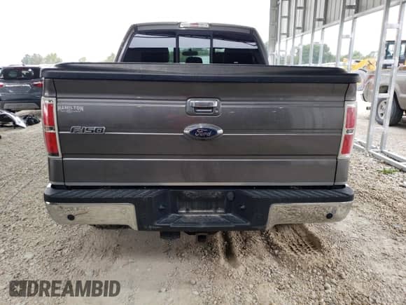 2013 Ford F-150 Lariat with VIN 1FTFW1ET2DFC87796, listed as a Copart auction lot 71112565 with 207,394 mi miles and Salvage title. Bid and sale history available at DreamBid. Image 6.