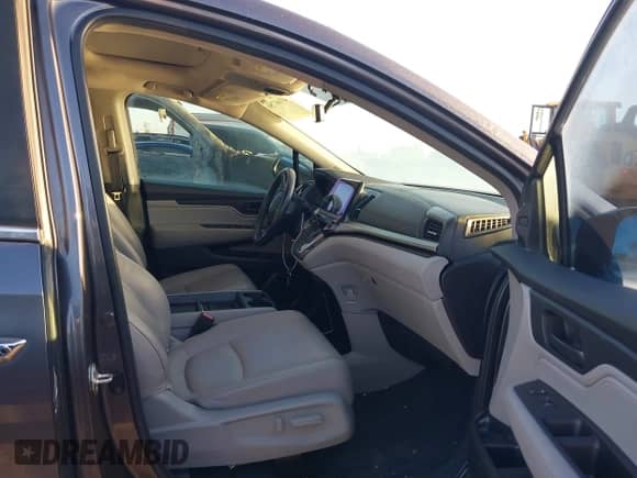 2019 Honda Odyssey EX-L с VIN 5FNRL6H75KB128015, выставлен на аукционе IAAI как лот 43161750 с пробегом Не указан миль и . История ставок и продаж доступна на DreamBid. Изображение 5.