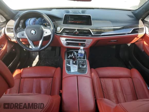 2017 BMW 7 Series 740e xDrive with VIN WBA7J2C3XHG497958, listed as a Copart auction lot 58203604 with 75,256 mi miles and Salvage title. Bid and sale history available at DreamBid. Image 8.