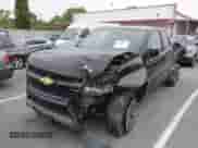 2018 Chevrolet Colorado 2WD Work Truck z VIN 1GCHSBEN1J1285106, wystawiony jako IAAI lot #42408472 z przebiegiem 68 524 mil mil oraz . Historia ofert i sprzedaży dostępna na DreamBid. Obrazek 2.