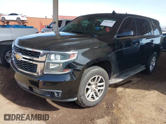2015 Chevrolet Tahoe Commercial with VIN 1GNLC2EC0FR629983, listed as a IAAI auction lot 41917584 with 111,461 mi miles and . Bid and sale history available at DreamBid. Image 2.