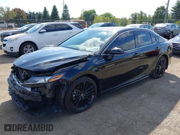 2024 Toyota Camry TRD with VIN 4T1KZ1AK4RU098035, listed as a IAAI auction lot 43315993 with 37,800 mi miles and . Bid and sale history available at DreamBid. Image 2.