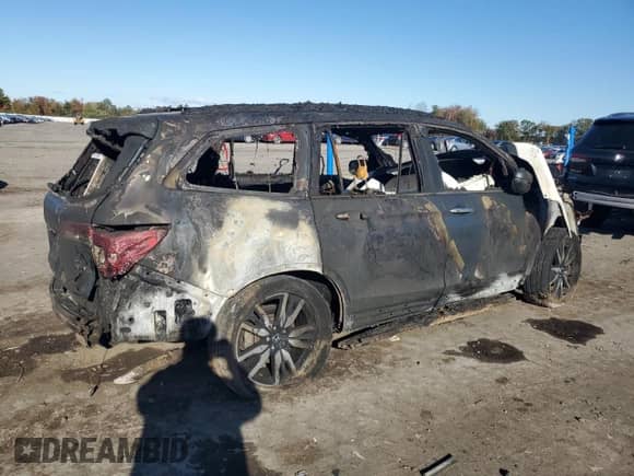 2021 Honda Pilot Elite с VIN 5FNYF6H03MB084346, выставлен на аукционе Copart как лот 87102845 с пробегом Не указан миль и На запчасти • Non repairable. История ставок и продаж доступна на DreamBid. Изображение 3.