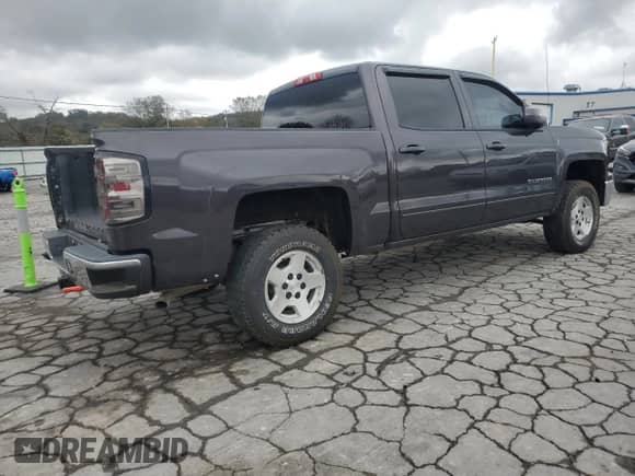 2015 Chevrolet Silverado 1500 LT с VIN 3GCUKREH3FG375593, выставлен на аукционе Copart как лот 90621815 с пробегом 128 700 миль миль и Списание • Salvage title. История ставок и продаж доступна на DreamBid. Изображение 3.