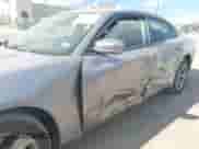 2016 Dodge Charger SXT with VIN 2C3CDXHG0GH196057, listed as a IAAI auction lot 43270915 with 244,696 mi miles and . Bid and sale history available at DreamBid. Image 6.