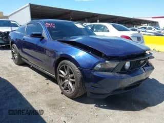 2012 Ford Mustang GT Premium with VIN 1ZVBP8CF8C5282296, listed as a IAAI auction lot 42978112 with 167,328 mi miles and . Bid and sale history available at DreamBid. Image 1.