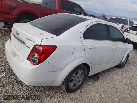 2013 Chevrolet Sonic LT с VIN 1G1JC5SB5D4257248, выставлен на аукционе Copart как лот 69287535 с пробегом 127 588 миль миль и Списание • Salvage title. История ставок и продаж доступна на DreamBid. Изображение 3.