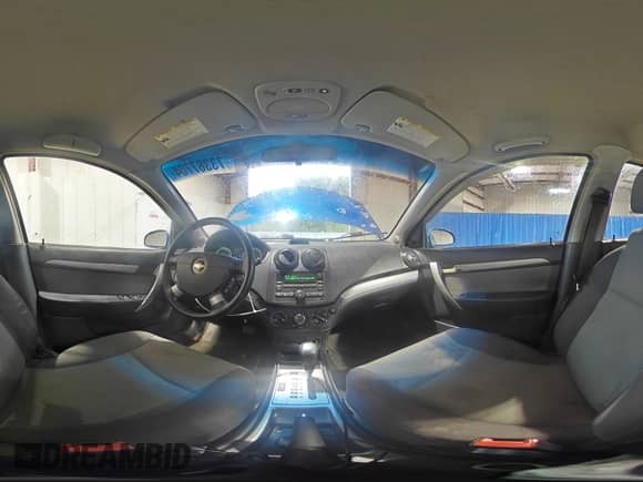 2009 Chevrolet Aveo 1LT z VIN KL1TD66E49B294633, wystawiony jako Copart lot #73367704 z przebiegiem 89 949 mil mil oraz Szkoda całkowita • Salvage title. Historia ofert i sprzedaży dostępna na DreamBid. Obrazek 13.