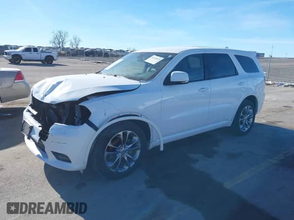 2020 Dodge Durango GT with VIN 1C4RDJDG7LC308164, listed as a IAAI auction lot 41337877 with 82,314 mi miles and . Bid and sale history available at DreamBid. Image 2.