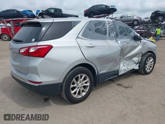 2018 Chevrolet Equinox LT with VIN 2GNAXJEV1J6211511, listed as a IAAI auction lot 43246513 with 98,802 mi miles and . Bid and sale history available at DreamBid. Image 4.