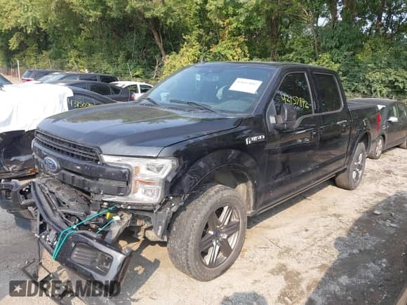 2020 Ford F-150 XLT with VIN 1FTEW1E4XLFB49538, listed as a IAAI auction lot 43157892 with 96,900 mi miles and . Bid and sale history available at DreamBid. Image 2.