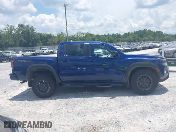 2022 Nissan Frontier Pro-4X with VIN 1N6ED1EK3NN634775, listed as a IAAI auction lot 42789790 with 25,453 mi miles and . Bid and sale history available at DreamBid. Image 14.