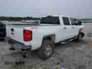 2016 Chevrolet Silverado 2500HD Work Truck z VIN 1GC1KUE84GF139477, wystawiony jako Copart lot #69049734 z przebiegiem 139 037 mil mil oraz Szkoda całkowita • Salvage title. Historia ofert i sprzedaży dostępna na DreamBid. Obrazek 3.
