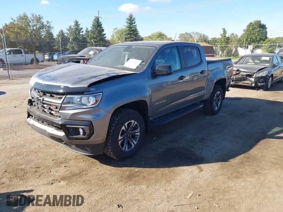 2022 Chevrolet Colorado 4WD Z71 z VIN 1GCGTDEN0N1259641, wystawiony jako IAAI lot #43339003 z przebiegiem 28 294 mil mil oraz . Historia ofert i sprzedaży dostępna na DreamBid. Obrazek 2.