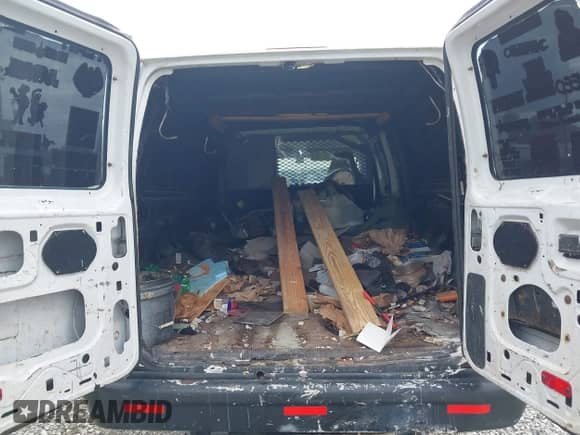2014 Ford Econoline Cargo Commercial with VIN 1FTNS2EW4EDA01130, listed as a IAAI auction lot 43405796 with 122,008 mi miles and . Bid and sale history available at DreamBid. Image 6.