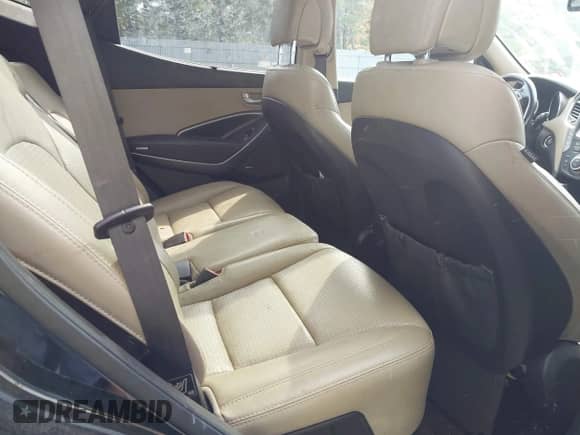 2014 Hyundai Santa Fe z VIN 5XYZUDLB1EG142908, wystawiony jako IAAI lot #43335665 z przebiegiem 175 825 mil mil oraz . Historia ofert i sprzedaży dostępna na DreamBid. Obrazek 8.
