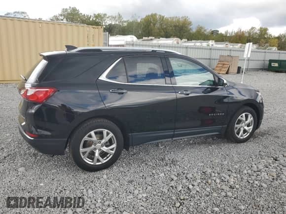 2020 Chevrolet Equinox Premier с VIN 2GNAXNEV4L6152643, выставлен на аукционе Copart как лот 82103365 с пробегом 64 405 миль миль и Списание • Salvage title. История ставок и продаж доступна на DreamBid. Изображение 3.