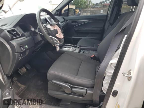 2019 Honda Passport Sport with VIN 5FNYF8H27KB013743, listed as a Copart auction lot 57519555 with 127,565 mi miles and Salvage title. Bid and sale history available at DreamBid. Image 7.
