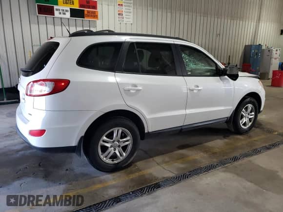 2012 Hyundai Santa Fe GLS с VIN 5XYZGDAB8CG155498, выставлен на аукционе Copart как лот 66804925 с пробегом 145 729 миль миль и Списание • Salvage title. История ставок и продаж доступна на DreamBid. Изображение 3.