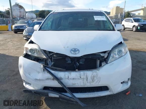 2013 Toyota Sienna XLE AAS with VIN 5TDYK3DC8DS324853, listed as a IAAI auction lot 41647704 with 143,656 mi miles and . Bid and sale history available at DreamBid. Image 12.