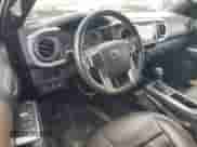 2017 Toyota Tacoma Limited with VIN 3TMGZ5AN1HM047851, listed as a Copart auction lot 82239165 with 127,129 mi miles and Clean title. Bid and sale history available at DreamBid. Image 8.