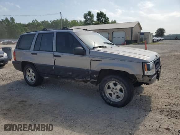 1994 Jeep Grand Cherokee Limited z VIN 1J4GZ78S1RC206288, wystawiony jako Copart lot #62392685 z przebiegiem 207 731 mil mil oraz Szkoda całkowita • Salvage title. Historia ofert i sprzedaży dostępna na DreamBid. Obrazek 4.