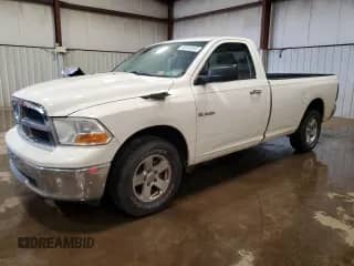 2009 Dodge 1500 SLT with VIN 1D3HB16P79J516569, listed as a Copart auction lot 53142355 with 156,439 mi miles and Salvage title. Bid and sale history available at DreamBid. Image 1.