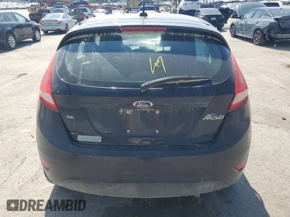 2011 Ford Fiesta SE with VIN 3FADP4EJ9BM135327, listed as a Copart auction lot 70479715 with 180,703 mi miles and Salvage title. Bid and sale history available at DreamBid. Image 6.