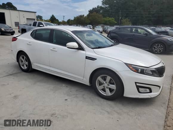 2015 Kia Optima LX with VIN KNAGM4A79F5630761, listed as a Copart auction lot 70302334 with 106,427 mi miles and Salvage title. Bid and sale history available at DreamBid. Image 4.