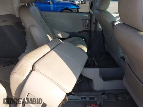 2012 Toyota Sienna XLE with VIN 5TDDK3DCXCS047622, listed as a IAAI auction lot 42858329 with 175,811 mi miles and . Bid and sale history available at DreamBid. Image 8.