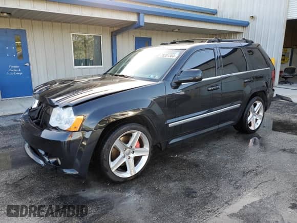 2009 Jeep Grand Cherokee with VIN 1J8HR78W19C537720, listed as a Copart auction lot 78381384 with 97,151 mi miles and Salvage title. Bid and sale history available at DreamBid. Image 1.
