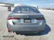 2025 BMW i4 xDrive40 with VIN WBY43HD05SFU20563, listed as a Copart auction lot 85369775 with 3,356 mi miles and Salvage title. Bid and sale history available at DreamBid. Image 6.