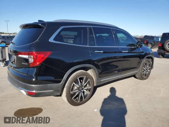 2022 Honda Pilot Touring 8-Passenger с VIN 5FNYF5H9XNB014112, выставлен на аукционе Copart как лот 48025165 с пробегом 64 061 миль миль и Списание • Salvage title. История ставок и продаж доступна на DreamBid. Изображение 3.