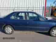 1994 Toyota Camry LE z VIN 4T1SK12EXRU374215, wystawiony jako IAAI lot #41581093 z przebiegiem 80 397 mil mil oraz . Historia ofert i sprzedaży dostępna na DreamBid. Obrazek 13.