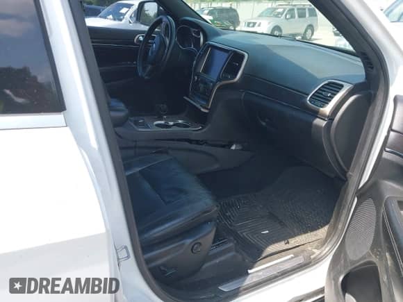 2014 Jeep Grand Cherokee Limited z VIN 1C4RJFBG8EC246639, wystawiony jako IAAI lot #42811330 z przebiegiem 129 719 mil mil oraz . Historia ofert i sprzedaży dostępna na DreamBid. Obrazek 5.