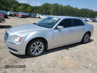 2012 Chrysler 300 C z VIN 2C3CCAETXCH242506, wystawiony jako Copart lot #71114885 z przebiegiem 162 587 mil mil oraz Czysty tytuł • Clean title. Historia ofert i sprzedaży dostępna na DreamBid. Obrazek 1.