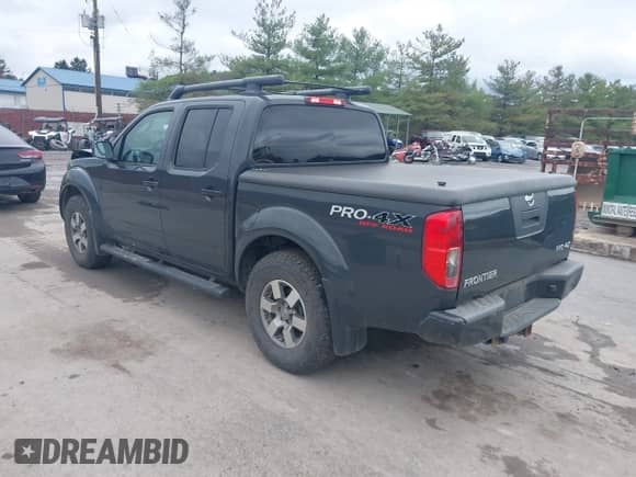 2011 Nissan Frontier Pro-4X with VIN 1N6AD0EVXBC449701, listed as a IAAI auction lot 43436699 with 223,651 mi miles and . Bid and sale history available at DreamBid. Image 3.