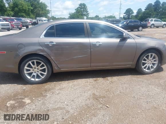 2012 Chevrolet Malibu LTZ z VIN 1G1ZG5E73CF146618, wystawiony jako IAAI lot #42333042 z przebiegiem 192 772 mil mil oraz . Historia ofert i sprzedaży dostępna na DreamBid. Obrazek 6.