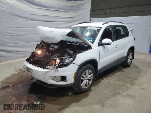 2015 Volkswagen Tiguan SEL with VIN WVGBV7AX5FW582595, listed as a Copart auction lot 68523275 with 128,991 mi miles and Salvage title. Bid and sale history available at DreamBid. Image 1.