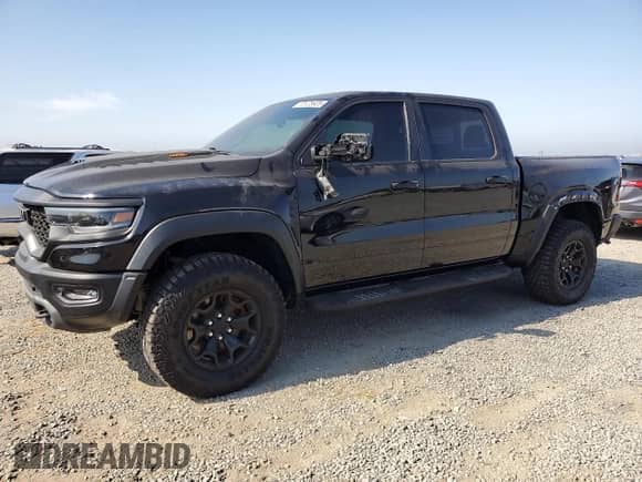 2022 Ram 1500 TRX z VIN 1C6SRFU96NN151419, wystawiony jako Copart lot #70125925 z przebiegiem 76 407 mil mil oraz Szkoda całkowita • Salvage title. Historia ofert i sprzedaży dostępna na DreamBid. Obrazek 1.