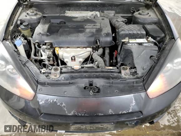 2008 Hyundai Tiburon GS with VIN KMHHM66D48U265282, listed as a Copart auction lot 77391204 with 77,088 mi miles and Salvage title. Bid and sale history available at DreamBid. Image 11.