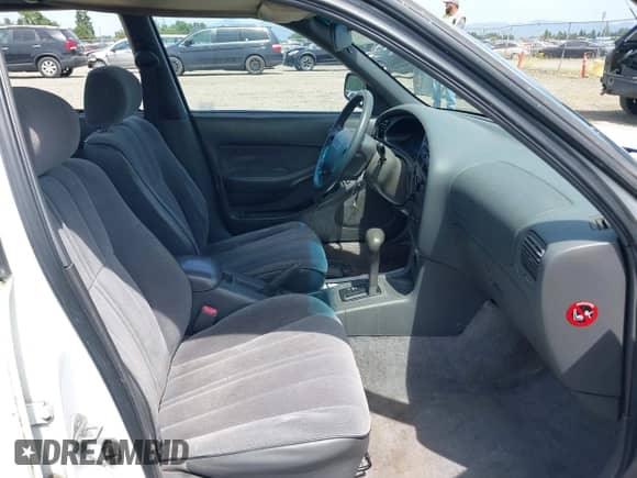 1996 Toyota Camry DX with VIN JT2BG12K7T0378581, listed as a IAAI auction lot 42454475 with 219,811 mi miles and . Bid and sale history available at DreamBid. Image 5.