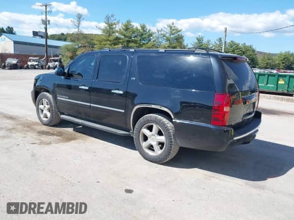 2009 Chevrolet Suburban LTZ z VIN 1GNFK36349R294901, wystawiony jako IAAI lot #43203353 z przebiegiem 187 400 mil mil oraz . Historia ofert i sprzedaży dostępna na DreamBid. Obrazek 3.