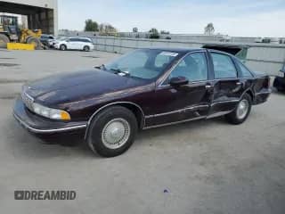 1993 Chevrolet Caprice with VIN 1G1BN53E6PW100473, listed as a Copart auction lot 84912235 with 173,412 mi miles and Salvage title. Bid and sale history available at DreamBid. Image 1.