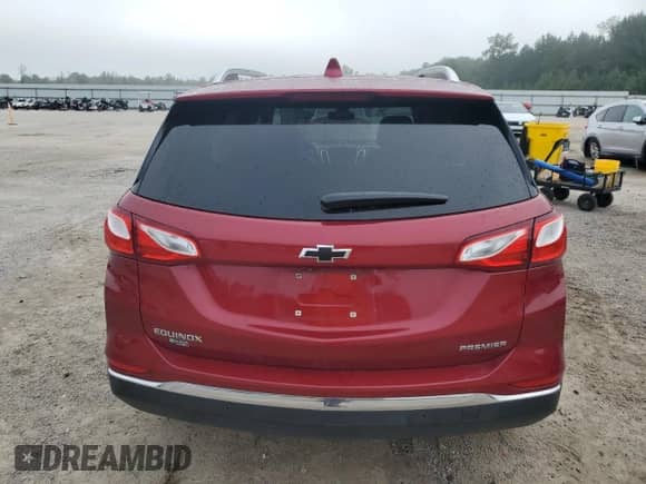 2021 Chevrolet Equinox Premier z VIN 2GNAXNEV2M6126589, wystawiony jako Copart lot #68116345 z przebiegiem 152 368 mil mil oraz Szkoda całkowita • Salvage title. Historia ofert i sprzedaży dostępna na DreamBid. Obrazek 6.