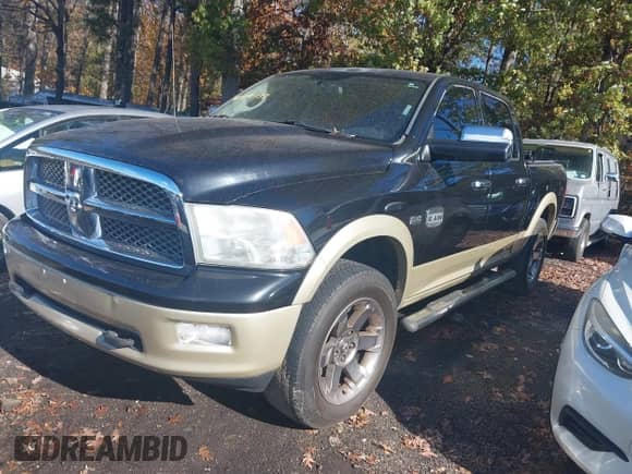 2011 Ram 1500 Outdoorsman with VIN 1D7RV1CT7BS633290, listed as a IAAI auction lot 40890733 with 167,346 mi miles and . Bid and sale history available at DreamBid. Image 2.
