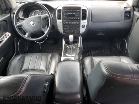 2007 Mercury Mariner Premier with VIN 4M2CU97197KJ16388, listed as a Copart auction lot 65154015 with 115,720 mi miles and Clean title. Bid and sale history available at DreamBid. Image 8.